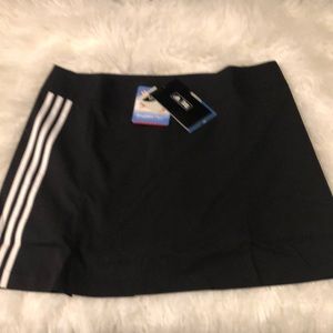 Adidas Golf Skort. NWT. SZ.14. Black with 2 pockets in back.